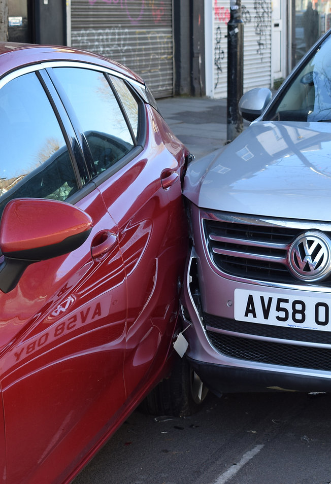 Two damaged cars after a street collision